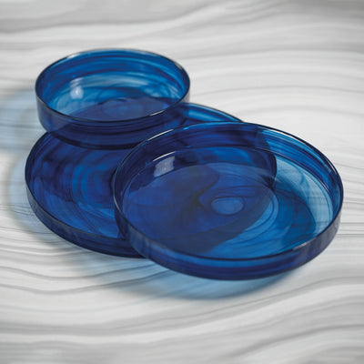 An elegant medium-sized indigo blue alabaster glass tray with subtle veining, perfect for serving appetizers or desserts