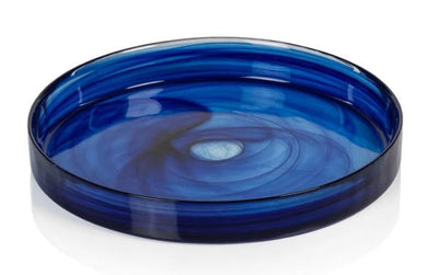 An elegant medium-sized indigo blue alabaster glass tray with subtle veining, perfect for serving appetizers or desserts